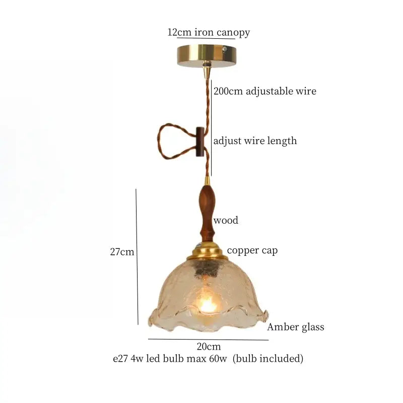 Vintage amber cracked glass led pendant lights with warm amber glass, wooden stem, brass accents, and adjustable wire suspension