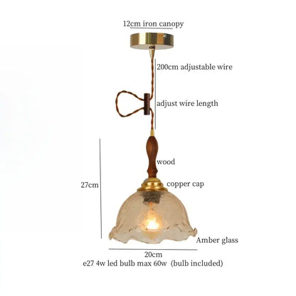 Vintage amber cracked glass led pendant lights with warm amber glass, wooden stem, brass accents, and adjustable wire suspension