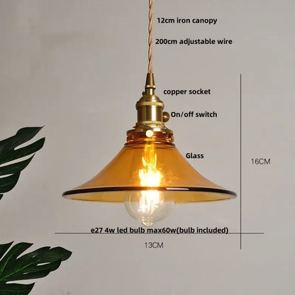 Vintage amber glass adjustable pendant light with brass copper socket and wire suspension for dining room use