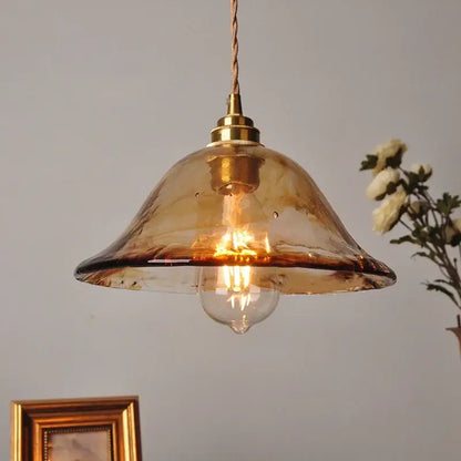 Vintage amber glass adjustable pendant light with warm amber glass and brass finish for dining room lighting