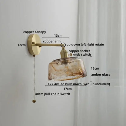 Antique brass-finished wall lamp with textured amber glass copper led shade and adjustable copper led wall arm for bedroom use