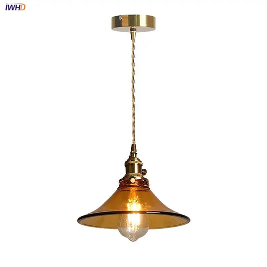 Vintage amber glass led pendant light with warm brass fixture and twisted copper wire suspension for kitchen decorbites amber glass