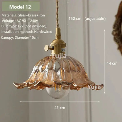 Vintage amber glass pendant light for kitchen island with delicate petal design and brass iron fixture