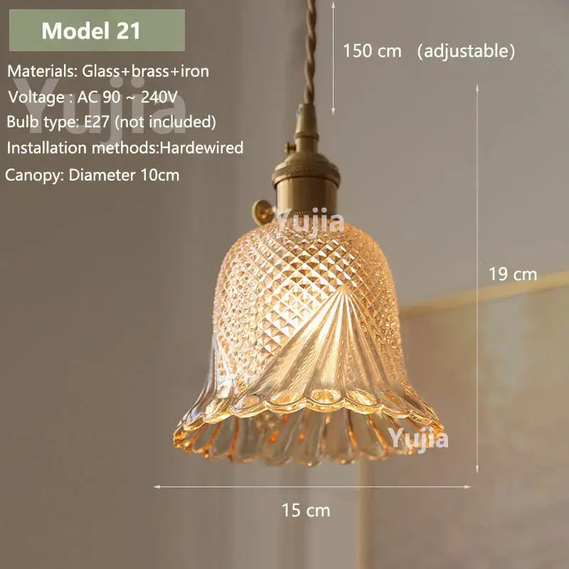 Vintage amber glass pendant light with textured shade and brass hardware for kitchen island lighting