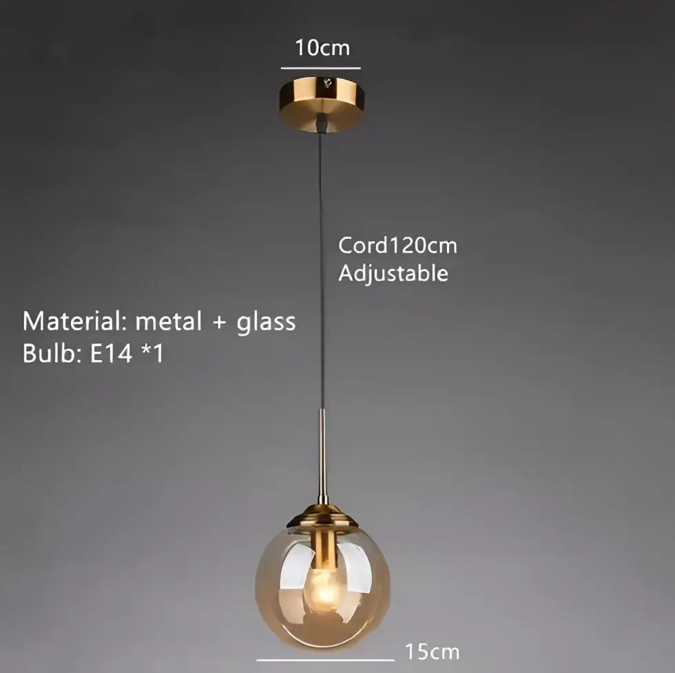 Vintage amber gold glass bubble chandelier featuring a spherical amber glass globe and gold-toned metal for kitchen island decorbites glass bubble