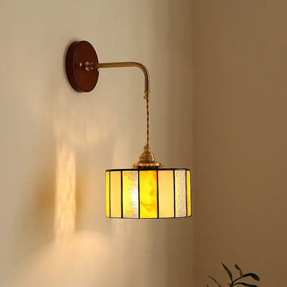 Vintage amber stained glass adjustable led wall lamp with brass finish and warm amber decorbites adjustable led lighting