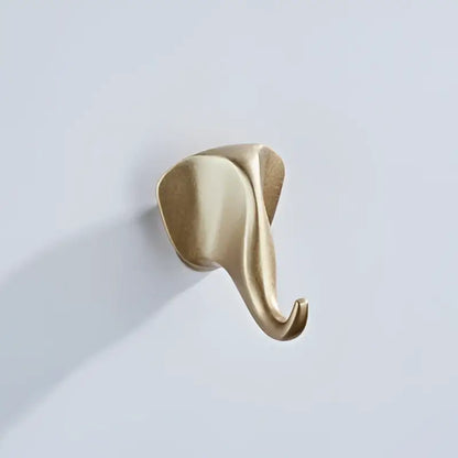 Gold-colored vintage animal brass robe hook with smooth polished metallic finish for bathroom wall decorbites brass robe hooks