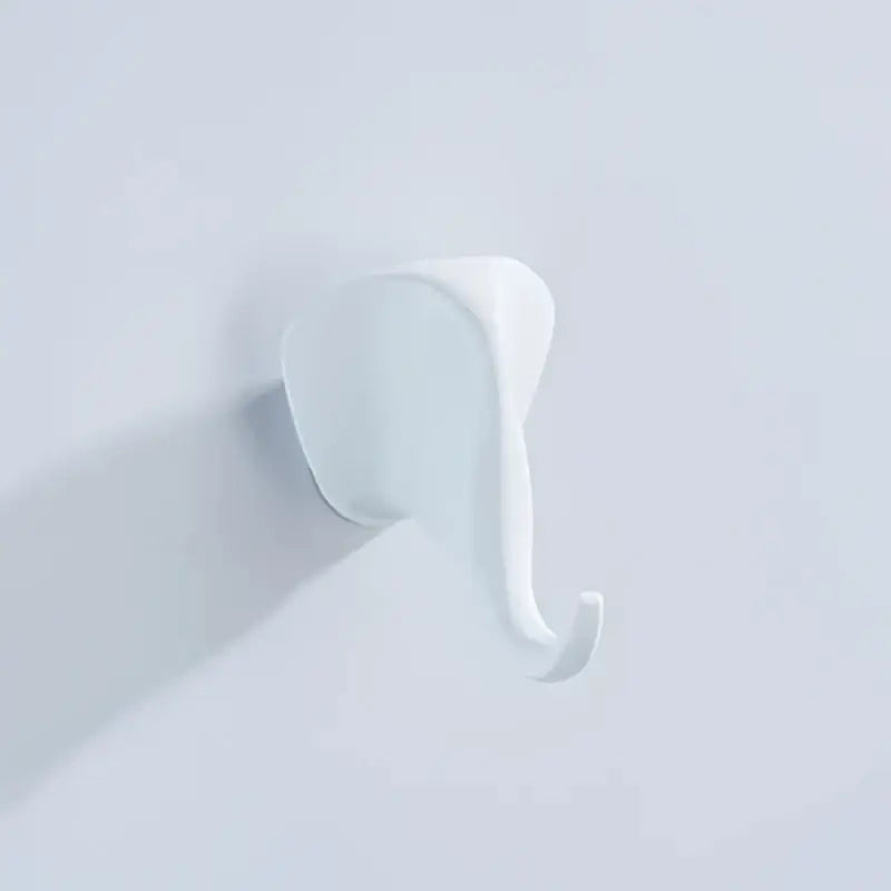 White elephant-shaped vintage brass robe hook with smooth glossy finish ideal for bathroom decorbites brass robe hooks decor