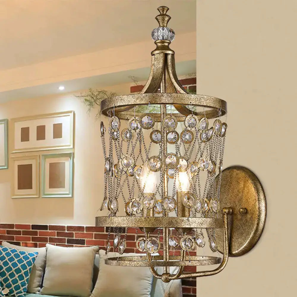Vintage antique brass crystal wall sconce with cascading droplets and chains compatible with e12 e14 bulb base