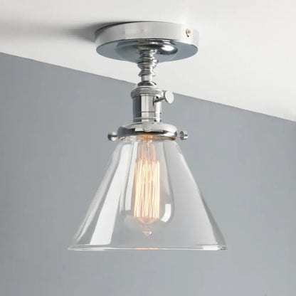 Chrome-finished funnel glass wall sconce with clear conical shade and exposed filament bulb for vintage decorbites bedroom lighting