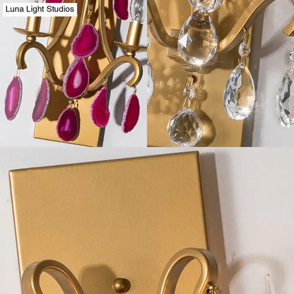 Gold-finished vintage wall lamp sconce with dark purple fuchsia geode slices and clear faceted crystal teardrops