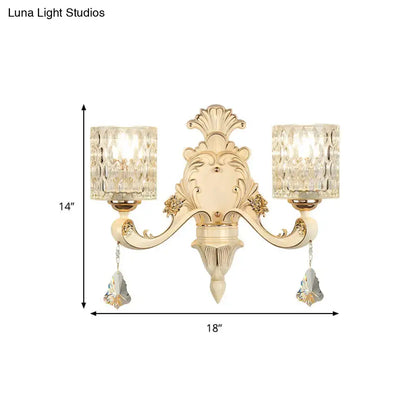 Vintage beige and gold glass wall light with crystal-encrusted shades and faceted pendants for bedroom use