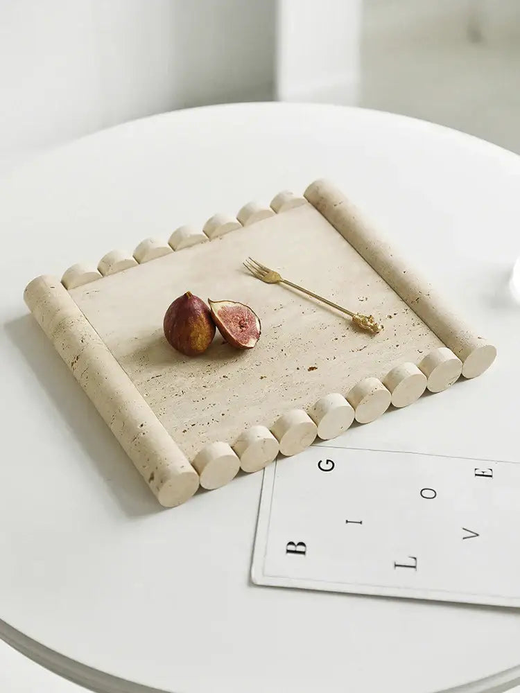 Beige travertine marble serving tray with rounded cylindrical edges and textured surface by decorbites beige travertine