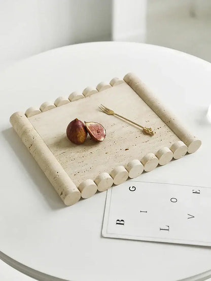 Beige travertine marble serving tray with rounded cylindrical edges and textured surface by decorbites beige travertine