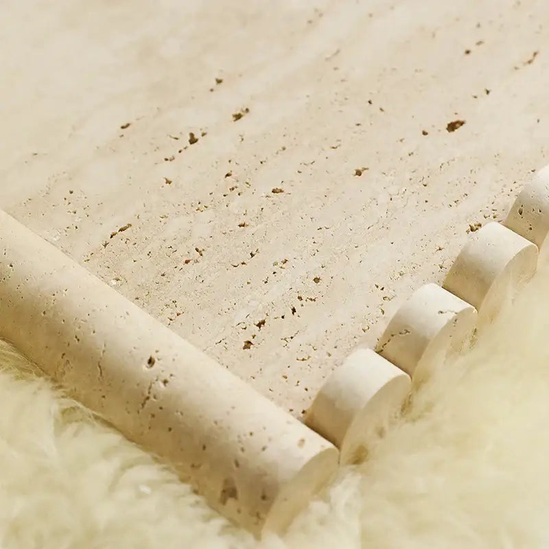 Beige travertine marble serving tray with textured stone tiles and natural speckled finish for kitchen use