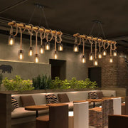 Vintage beige wooden beam chandelier featuring rustic rope knots and glass bulb fixtures ideal for kitchen island lighting
