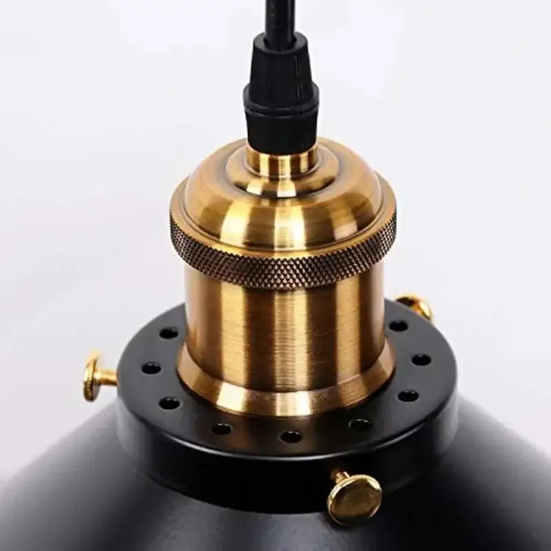 Vintage black and brass metal pendant light with black metal dome shade and textured brass finish for kitchen island lighting
