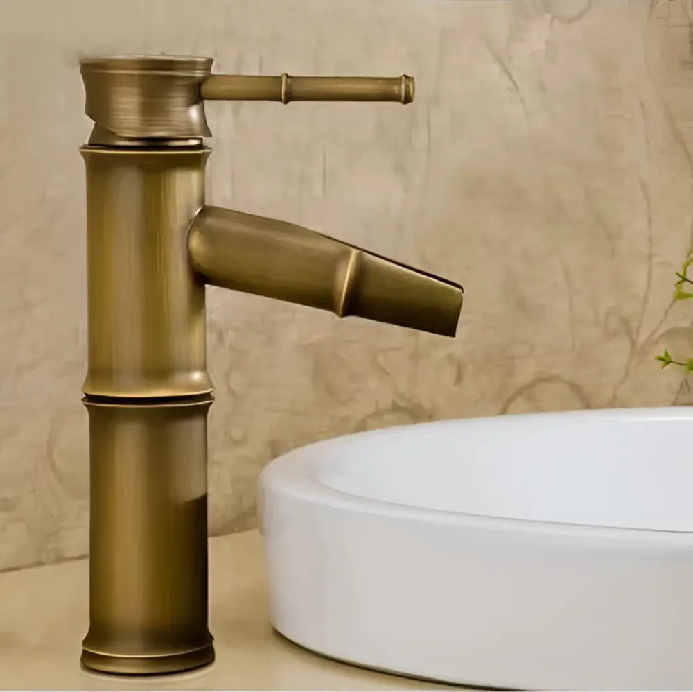 Antique brass vintage bathroom faucet with bamboo-style segmented design and single handle for bathroom sink tap