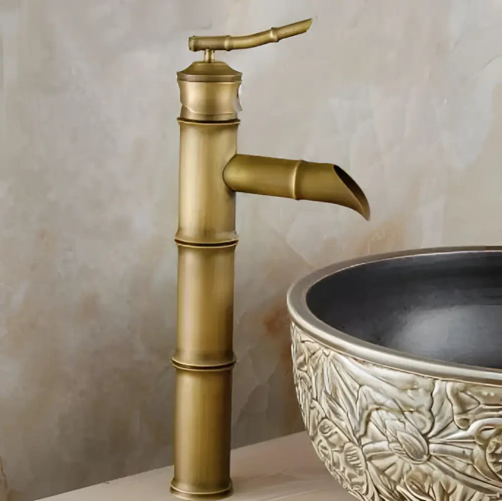 Brass vintage bathroom faucet with black copper bamboo-style segmented curved spout for bathroom sink use