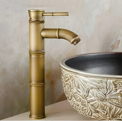 Brass vintage bathroom faucet with matte finish and bamboo-style segmented design for bathroom sink use