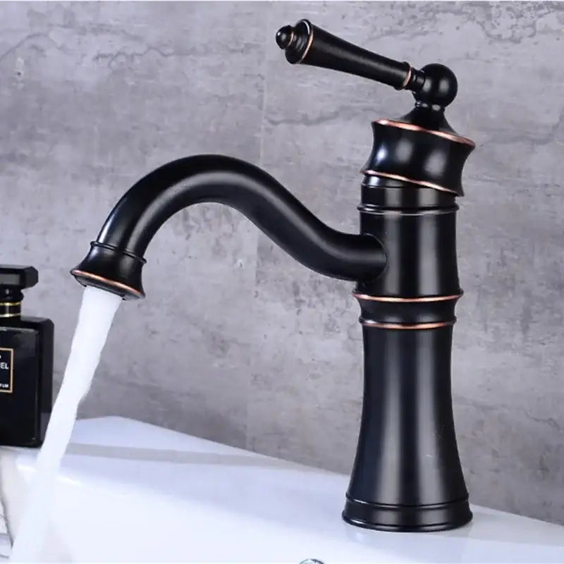 Vintage black and copper high arch basin faucet with single handle and matte finish for elegant bathroom use