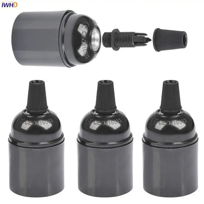 Vintage black e27 socket bulb holder with ribbed black plastic top and threaded metal inserts for kitchen lamp holder