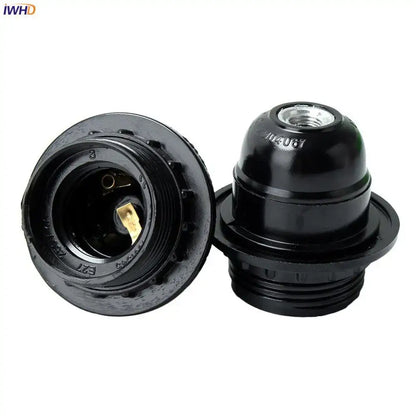 Vintage black e27 socket bulb holder made of plastic with threaded base and brass contacts for kitchen lamp holder use