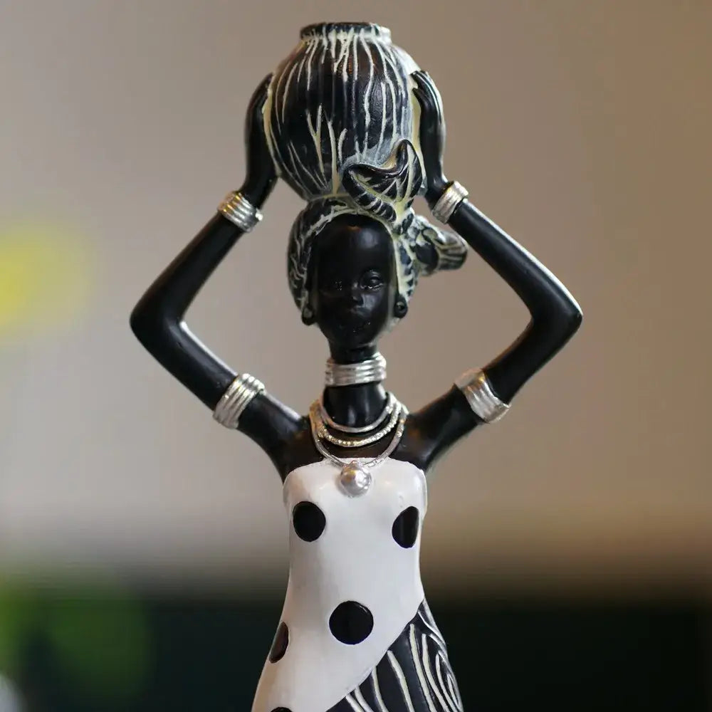 Vintage black and gold african women resin figurine with polka dot dress silver jewelry carrying striped vessel for decorbites african women decor