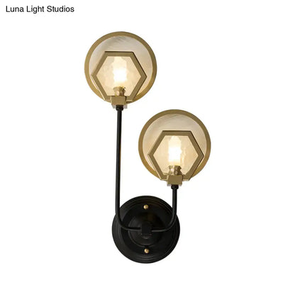Vintage black and brass two-light wall lamp with hexagonal glass shades for elegant living space lighting