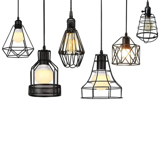 Vintage black metal pendant light with geometric cage design and exposed bulbs as a kitchen light source