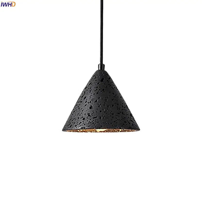 Vintage black travertine led pendant light with textured perforated exterior and warm gold interior for living room decorbites black travertine