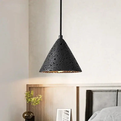 Vintage black travertine led pendant light with textured cone shape and gold-lined interior for living room decorbites black travertine
