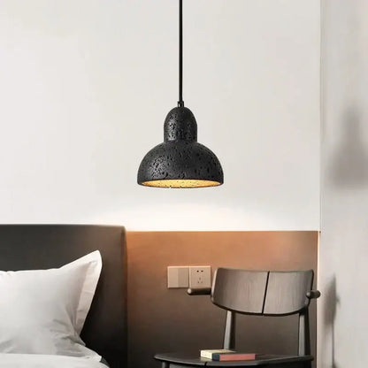 Vintage black travertine led pendant light with textured speckled matte finish and warm interior for living room decorbites black travertine