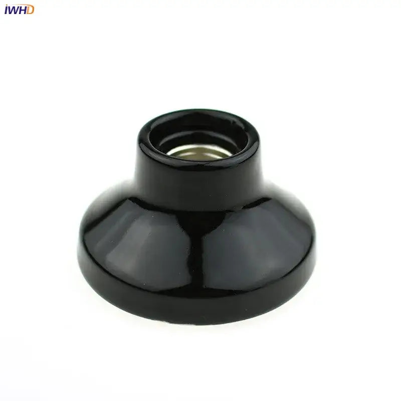 Vintage black and white ceramic lamp holder base with glossy finish and metallic threaded interior for bedroom socket