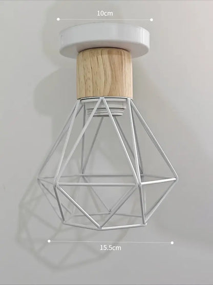 Vintage black iron cage pendant light with wood accent and white base for dining room lighting in square meters