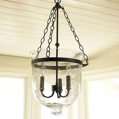 Vintage black wrought iron pendant lamp with clear glass and three candle-style bulbs for dining room decorbites black vintage
