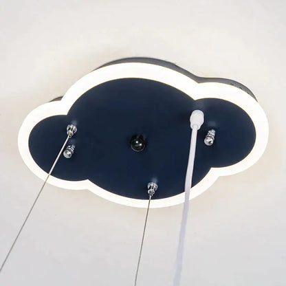 A modern cloud-shaped pendant light with navy blue body and glowing white led trim for boys bedroom decorbites iron aircraft