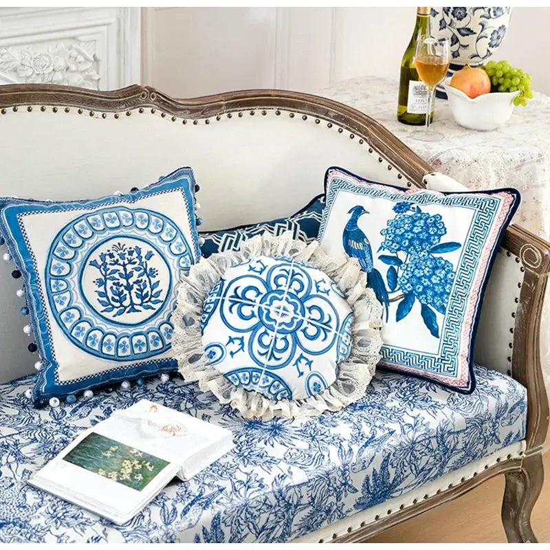 Vintage blue and cream peacock toile pillow cover with decorative fringes and pom-poms cushion case for living room