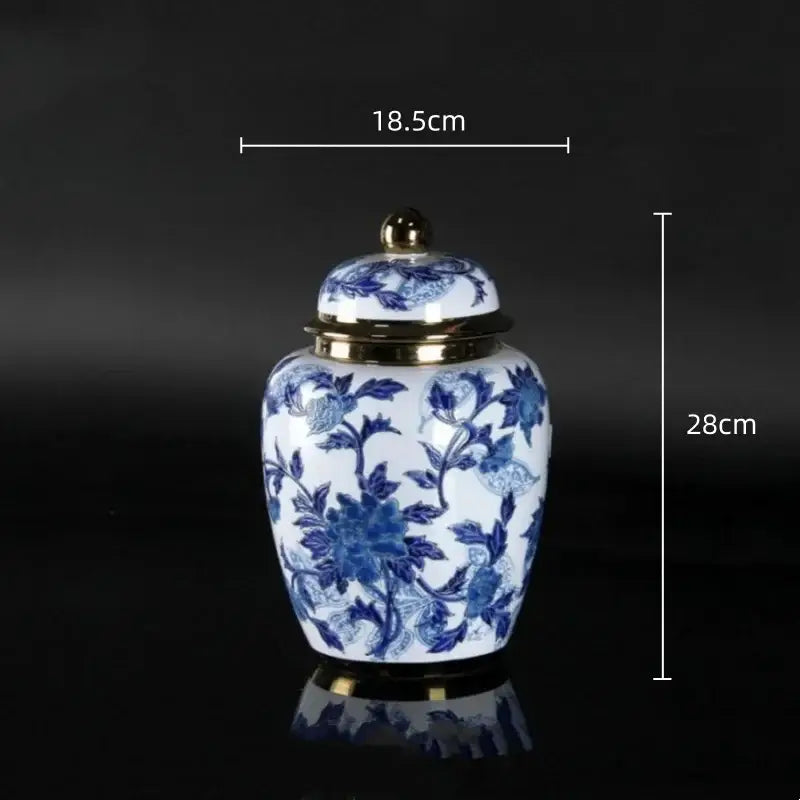 Vintage blue and white porcelain ceramic vase with intricate floral patterns and gold trim for home decor