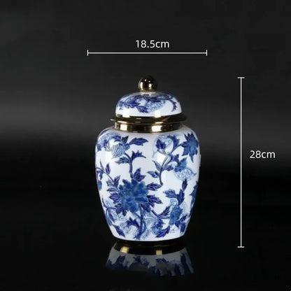 Vintage blue and white porcelain ceramic vase with intricate floral patterns and gold trim for home decor