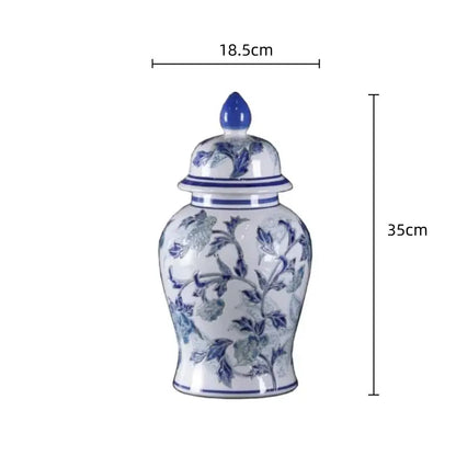 A vintage blue and white porcelain ceramic vase with intricate floral patterns for elegant home decor