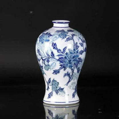 Vintage blue and white porcelain ceramic vase with intricate floral patterns ideal for home decor living room use