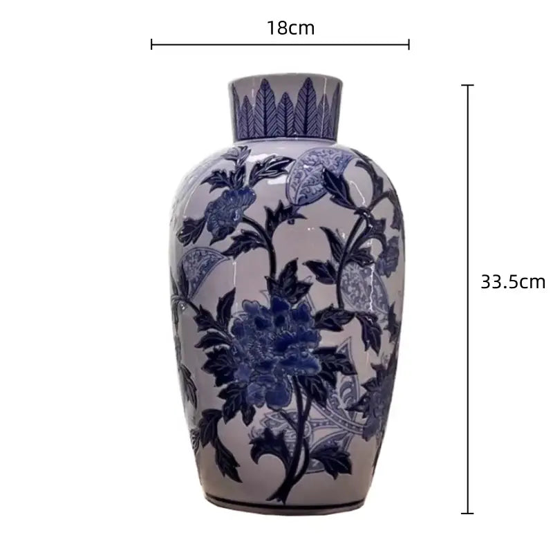 Vintage blue and white porcelain ceramic vase with intricate cobalt floral patterns for elegant home decor