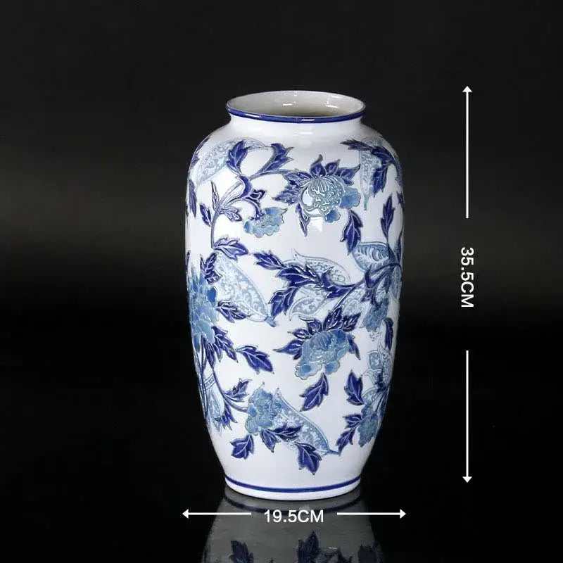 Vintage blue and white porcelain ceramic vase with intricate floral patterns ideal for home decor and living room display