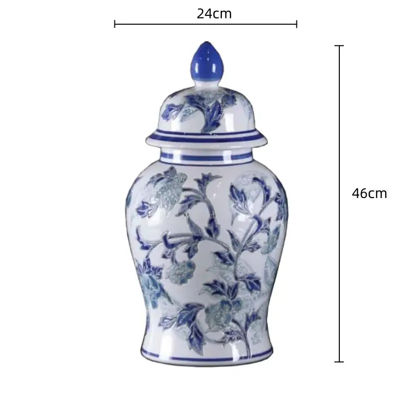 Vintage blue and white porcelain ceramic vase with intricate floral patterns and cobalt-blue finial for home decor