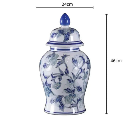 Vintage blue and white porcelain ceramic vase with intricate floral patterns and cobalt-blue finial for home decor