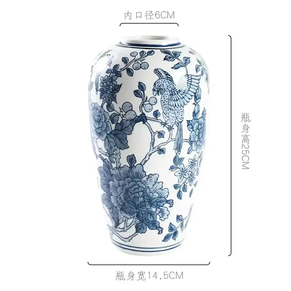 Vintage blue white porcelain vase featuring intricate hand-painted birds and blossoms for living room decorbites decor