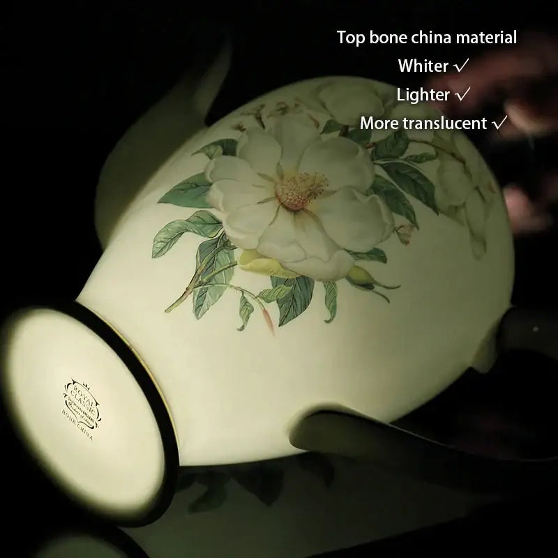 Delicate white bone china milk jug with gold trim and hand-painted floral design by decorbites bone china