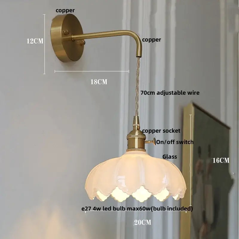 Vintage brass wall sconce with amber coffee glass and delicate petal-shaped shade for bedroom led lighting