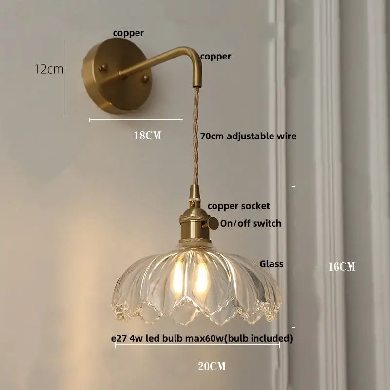 Vintage brass wall sconce with clear petal-shaped amber coffee glass shade ideal for bedroom LED lighting